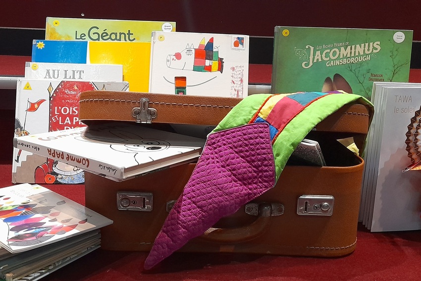 La valise avec des livres