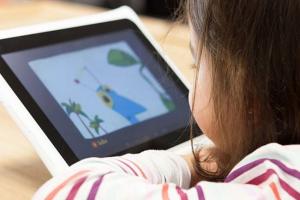 Visuel Enfant sur une tablette